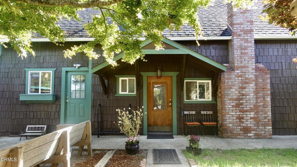 31421 State Highway 20 Fort Bragg, CA 95437 - Photo 3 of 28 a front view of a house with a yard