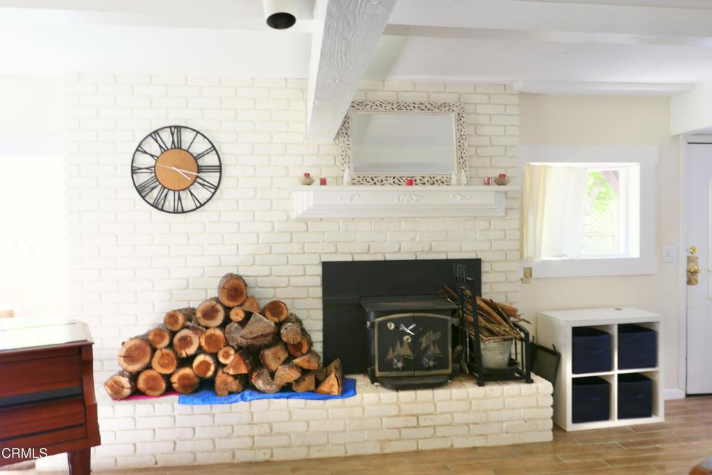 31421 State Highway 20 Fort Bragg, CA 95437 - Photo 6 of 28 a view of a livingroom with a fireplace and window
