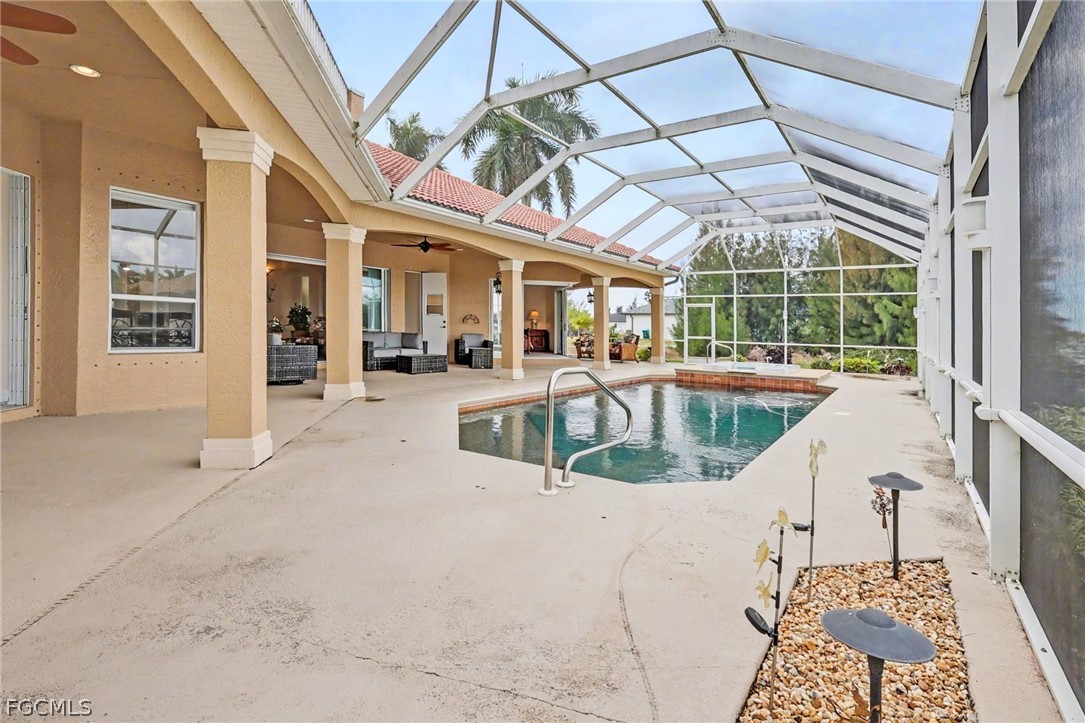4113 Northwest 26th Street Cape Coral, FL 33993 - Photo 26 of 37 a view of a living room and balcony