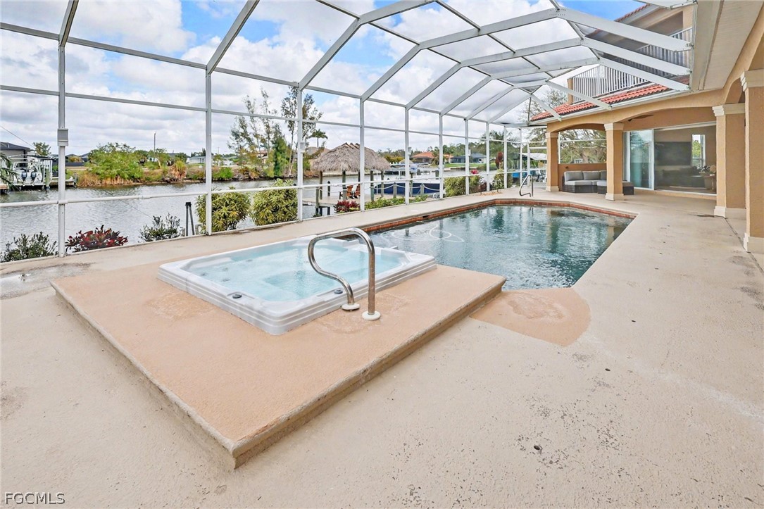 4113 Northwest 26th Street Cape Coral, FL 33993 - Photo 29 of 37 a view of a swimming pool and outdoor space
