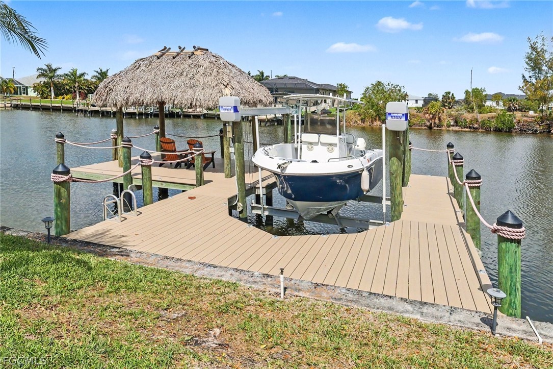 4113 Northwest 26th Street Cape Coral, FL 33993 - Photo 30 of 37 a view of a swimming pool with a lounge chairs