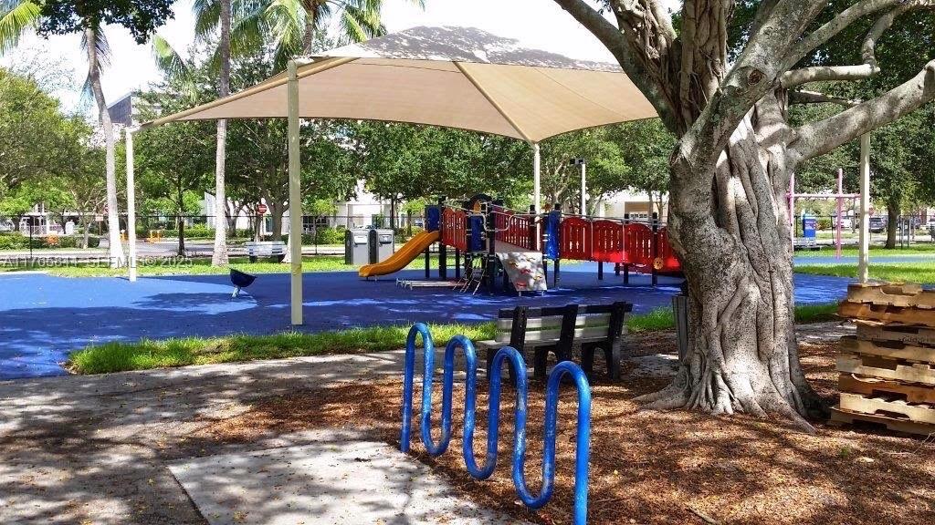 2201 Northeast 66th Street, Unit 1301 Fort Lauderdale, FL 33308 - Photo 19 of 23 an outdoor space with seating space