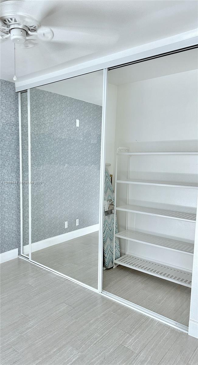 2201 Northeast 66th Street, Unit 1301 Fort Lauderdale, FL 33308 - Photo 8 of 23 a view of an empty room with a bathroom