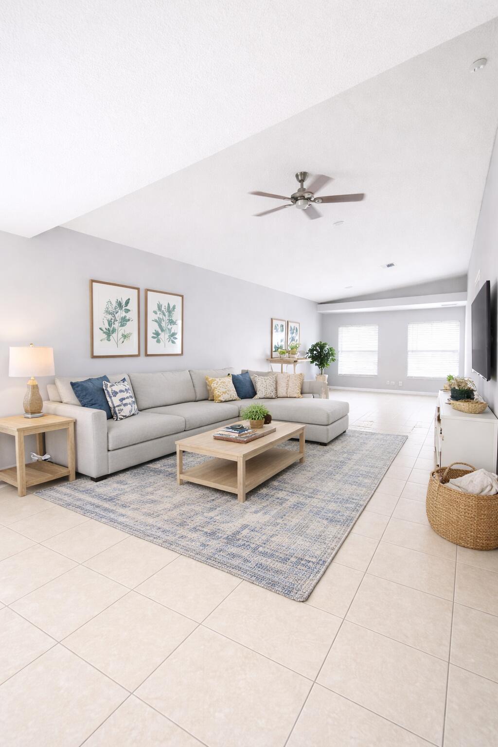 13218 86th Road North West Palm Beach, FL 33412 - Photo 13 of 40 a living room with furniture and a chandelier