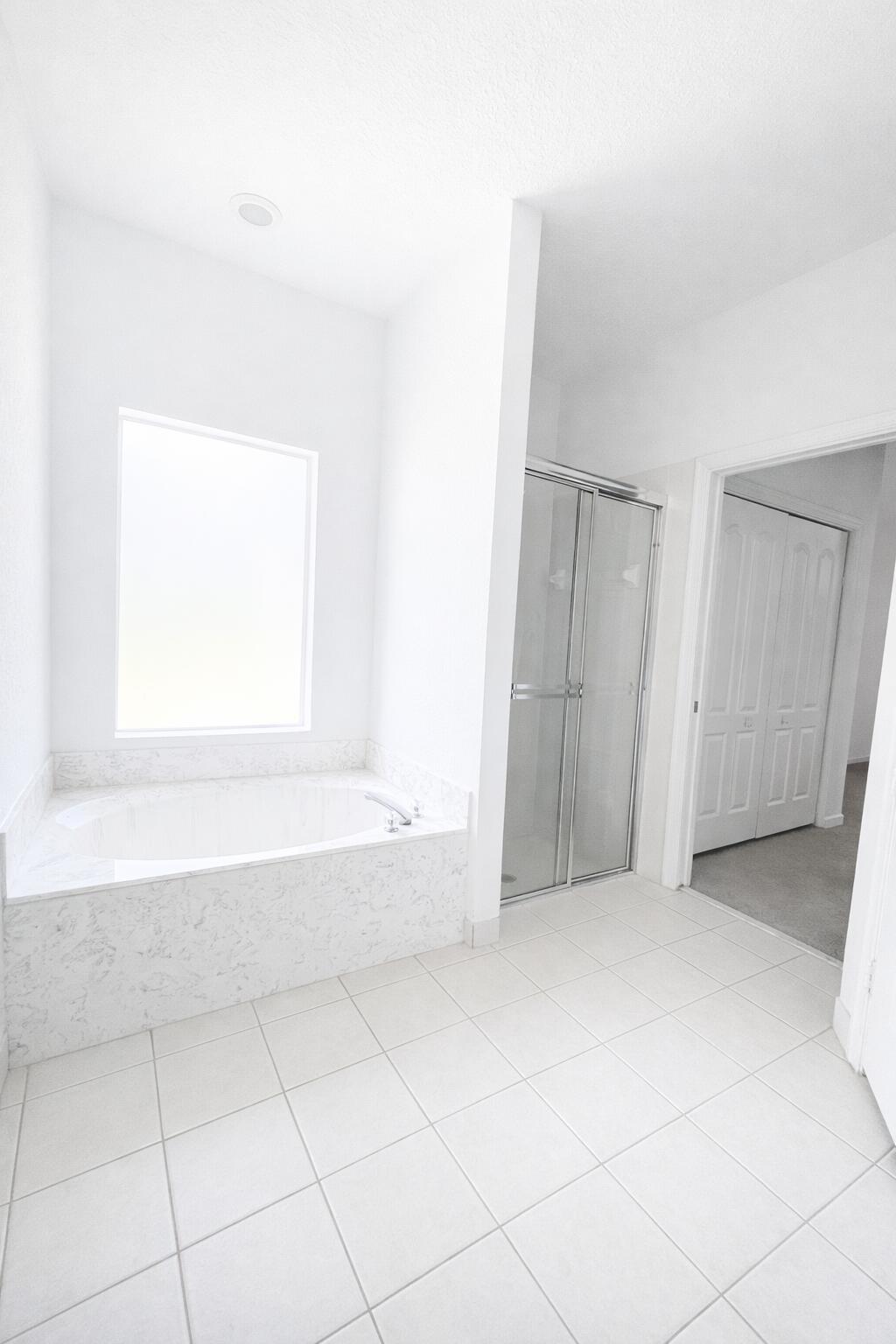 13218 86th Road North West Palm Beach, FL 33412 - Photo 20 of 40 a view of an empty room with a window