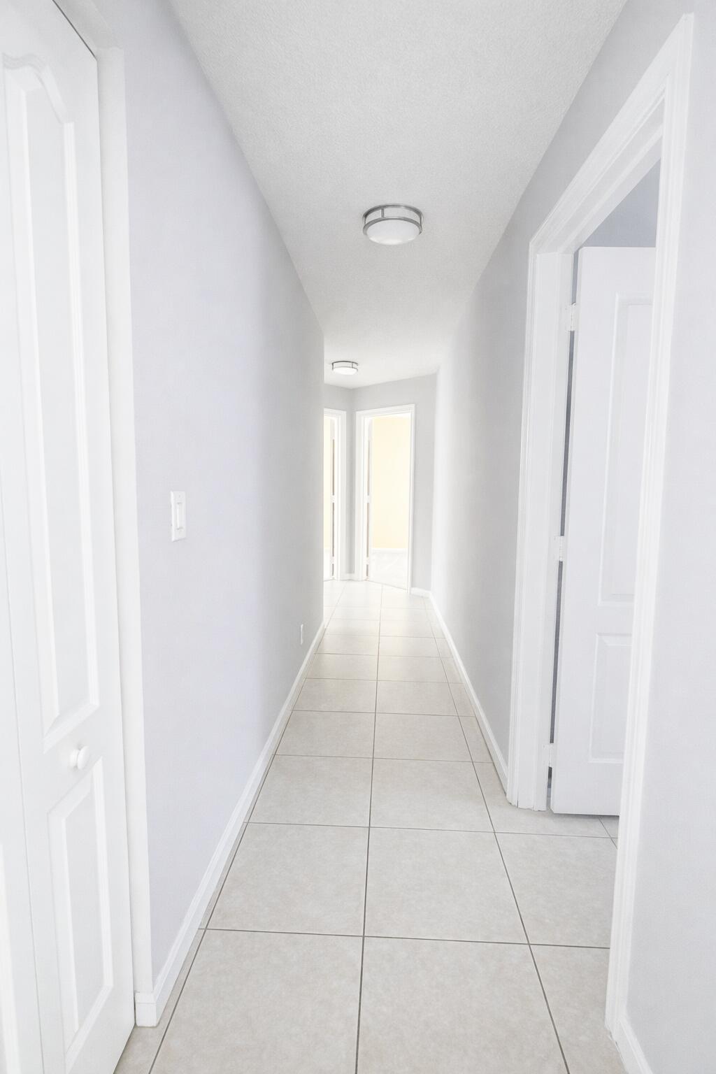 13218 86th Road North West Palm Beach, FL 33412 - Photo 23 of 40 hallway to bedrooms 2,2,4