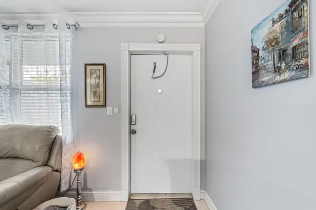 a living room with furniture and a window