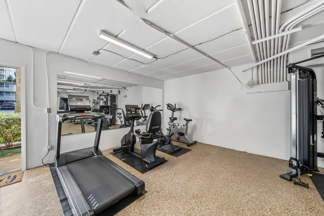 a view of a room with gym equipment