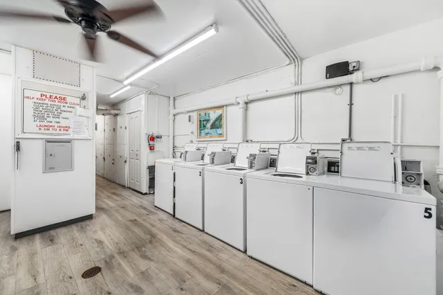 a kitchen with cabinets and window
