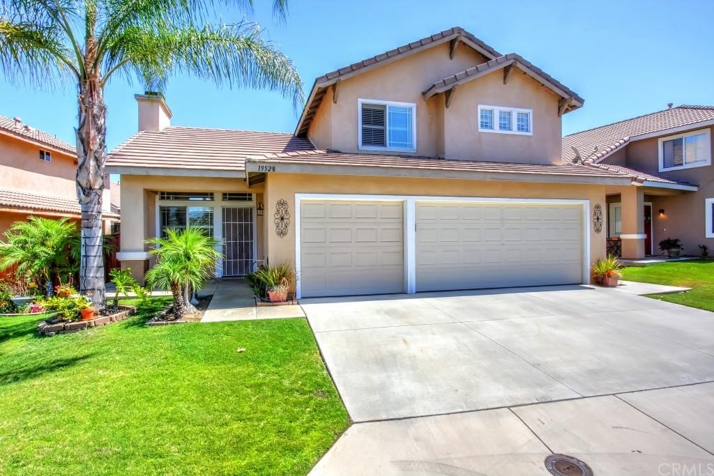 19528 Botany Bay Road Riverside, CA 92508 - Photo 1 of 1 a front view of house with yard and green space