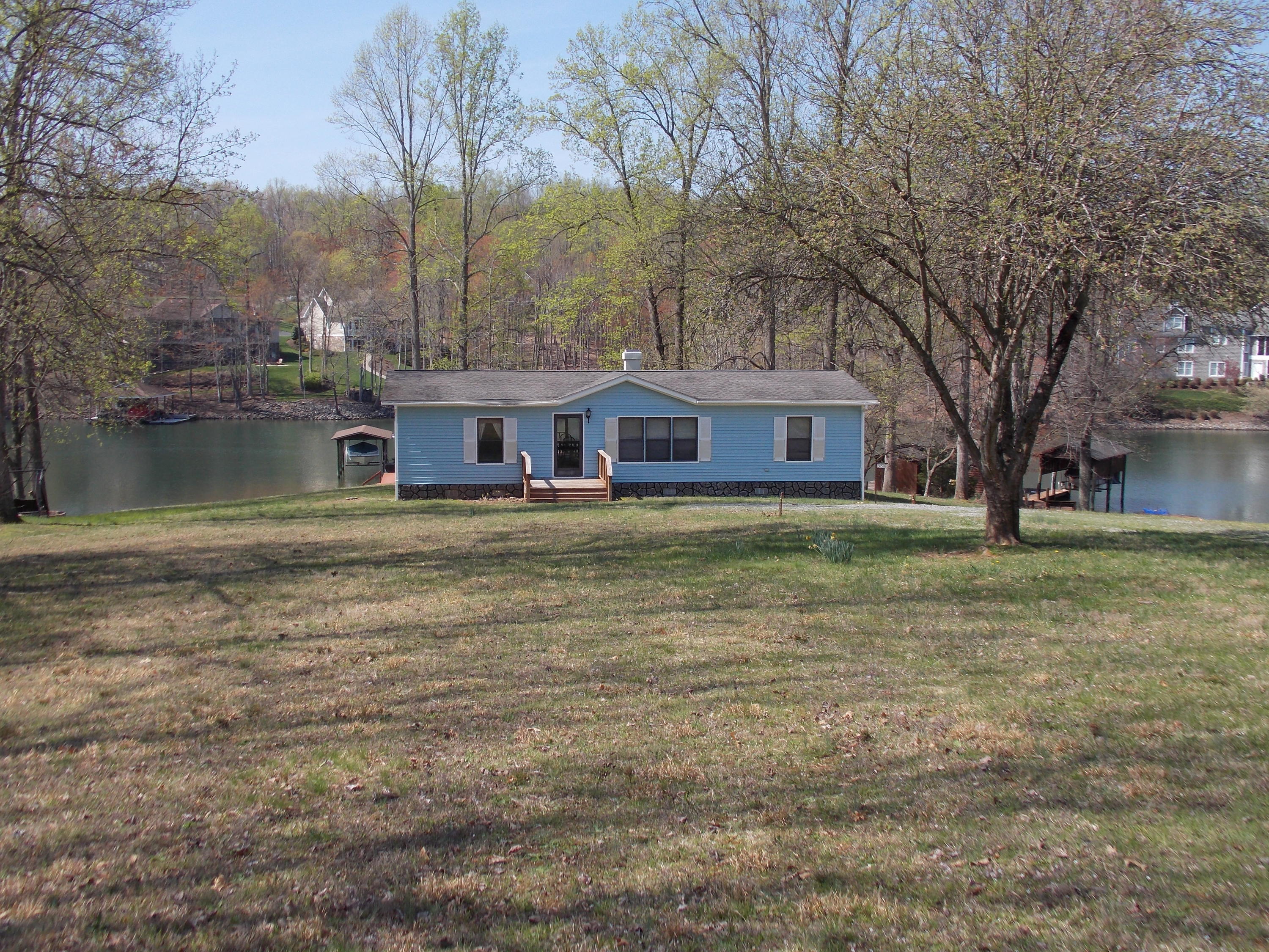 356 Cool Branch Road Penhook, VA 24137 - Photo 2 of 40 a view of a house with a yard
