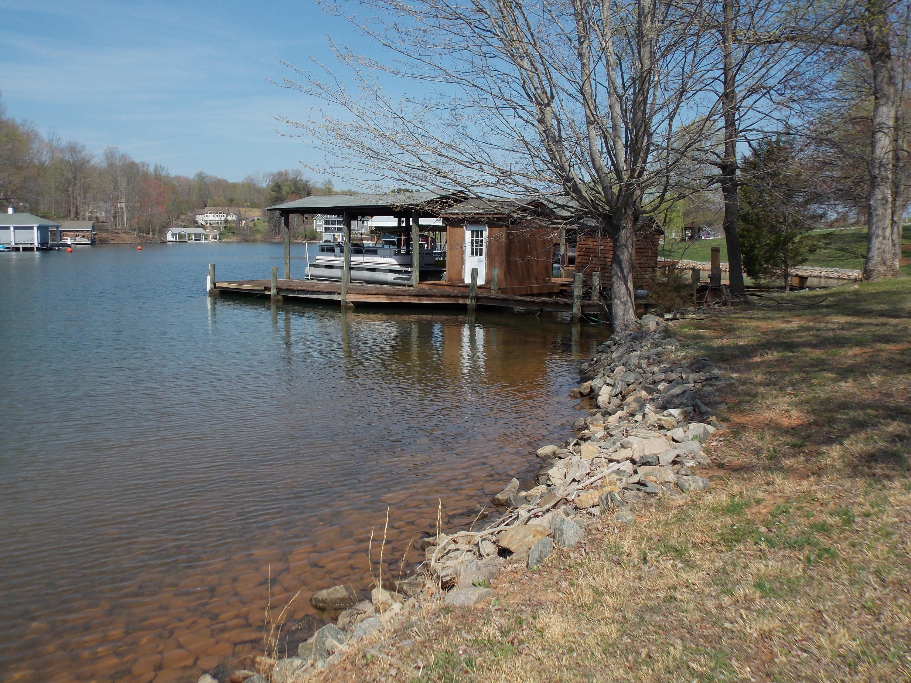 356 Cool Branch Road Penhook, VA 24137 - Photo 12 of 40 a view of a lake with a mountain