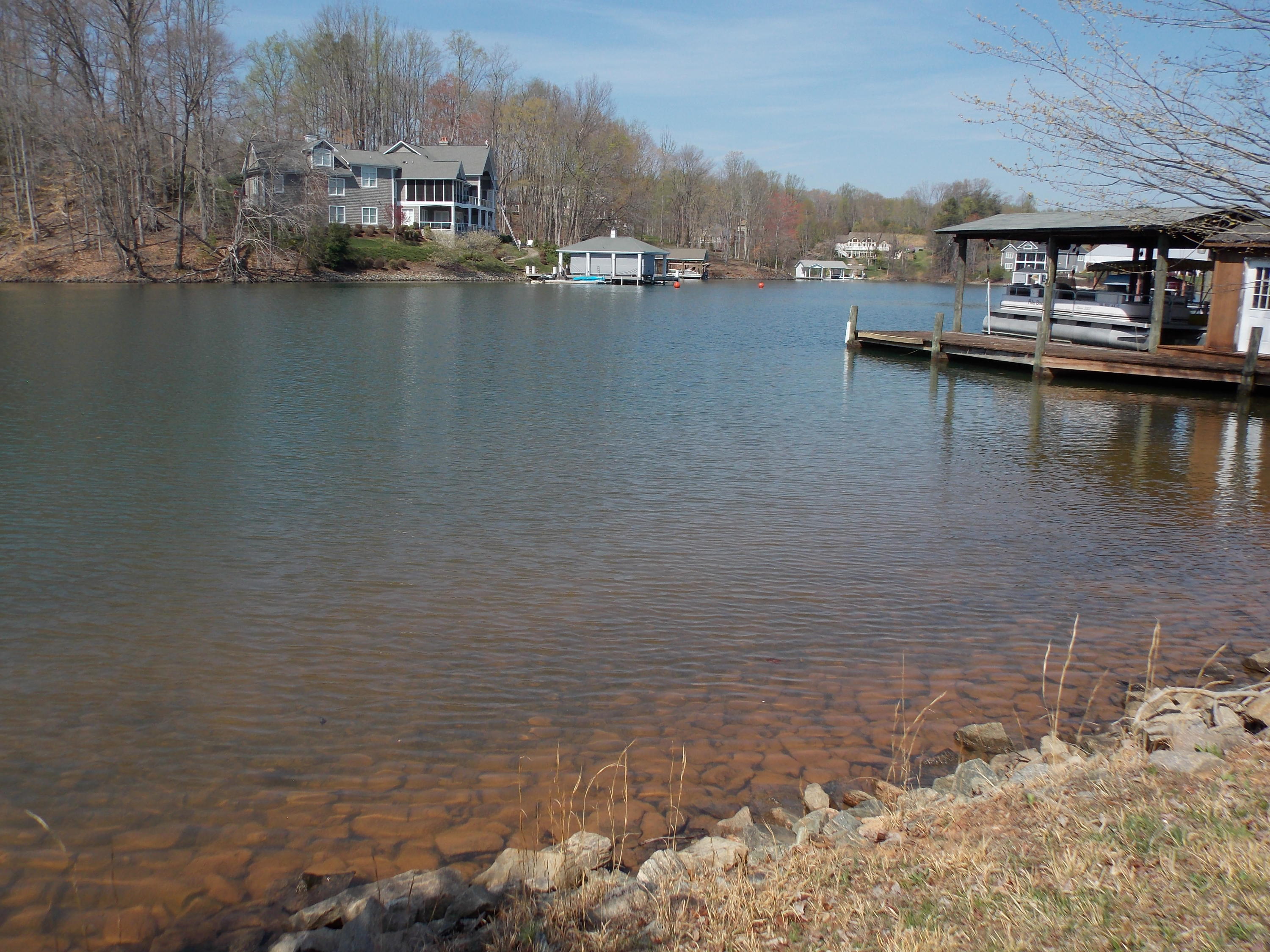 356 Cool Branch Road Penhook, VA 24137 - Photo 13 of 40 a view of residential house with outdoor space and lake view