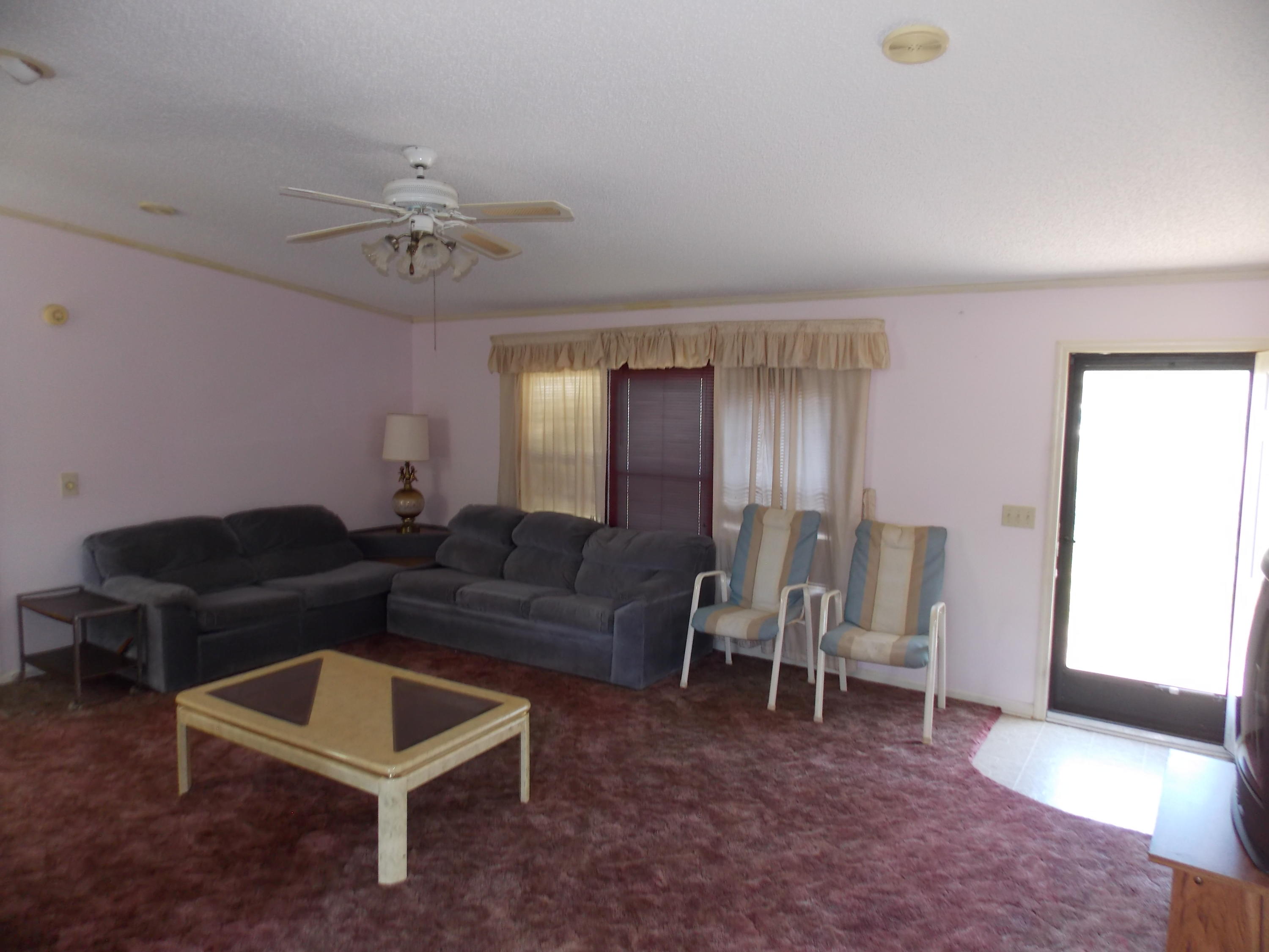 356 Cool Branch Road Penhook, VA 24137 - Photo 27 of 40 a living room with furniture and a window