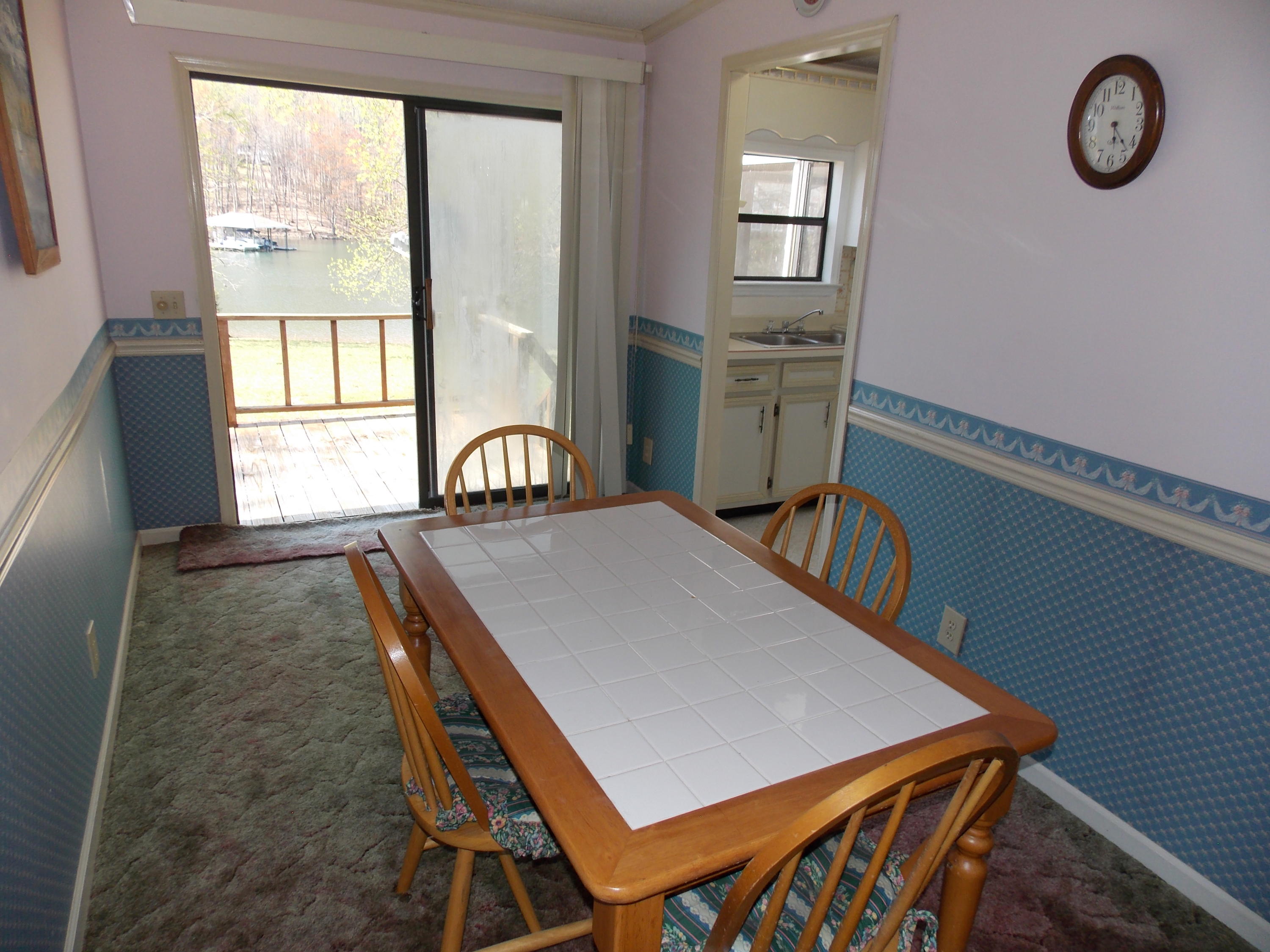 356 Cool Branch Road Penhook, VA 24137 - Photo 31 of 40 a dining room with furniture and window