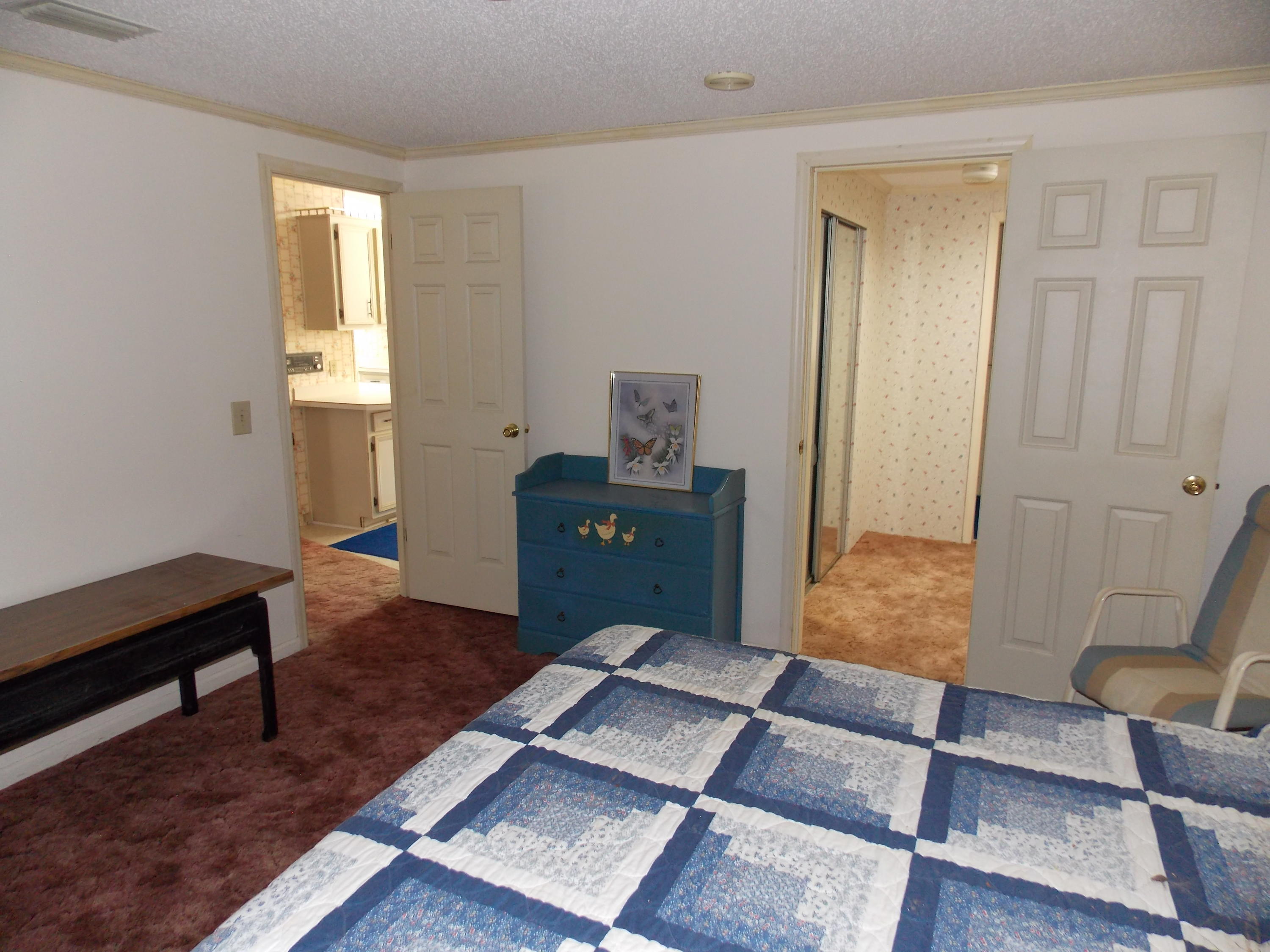 356 Cool Branch Road Penhook, VA 24137 - Photo 36 of 40 a living room with furniture and a wooden floor