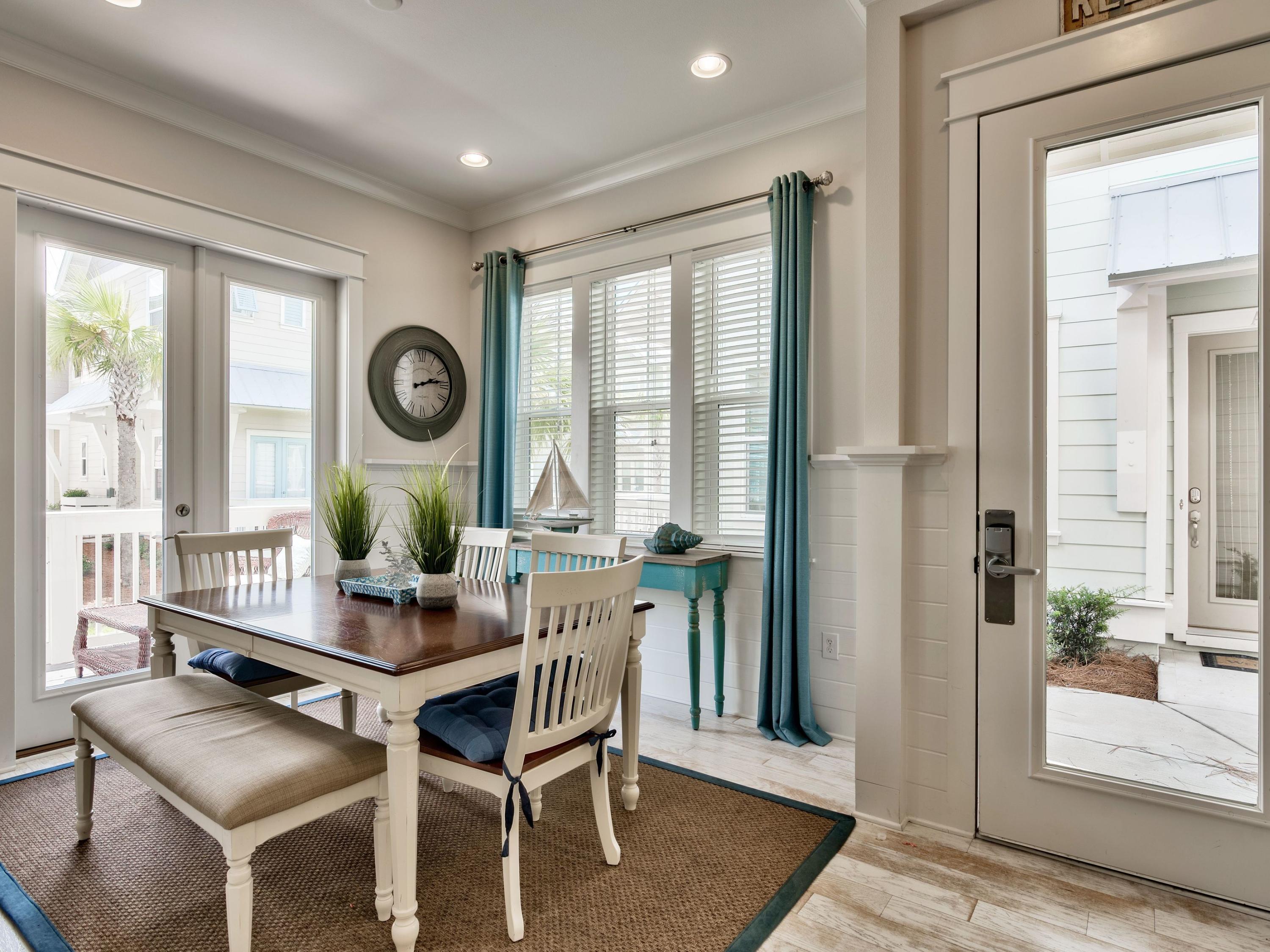 25 York Ln Inlet Beach, Unit B Inlet Beach, FL 32461 - Photo 3 of 14 a dining room with furniture and window