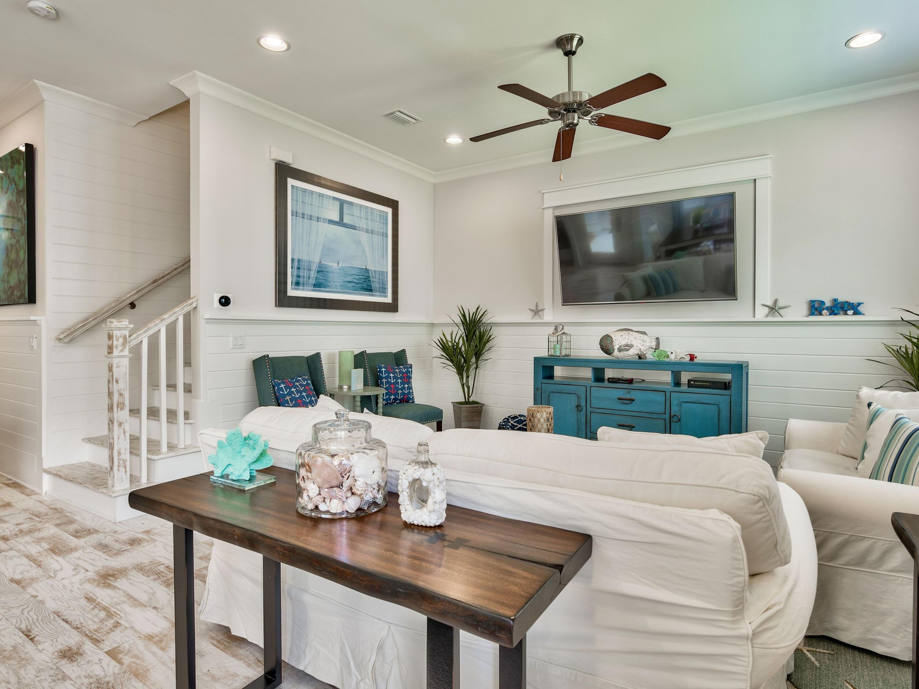 25 York Ln Inlet Beach, Unit B Inlet Beach, FL 32461 - Photo 5 of 14 a living room with furniture and a flat screen tv