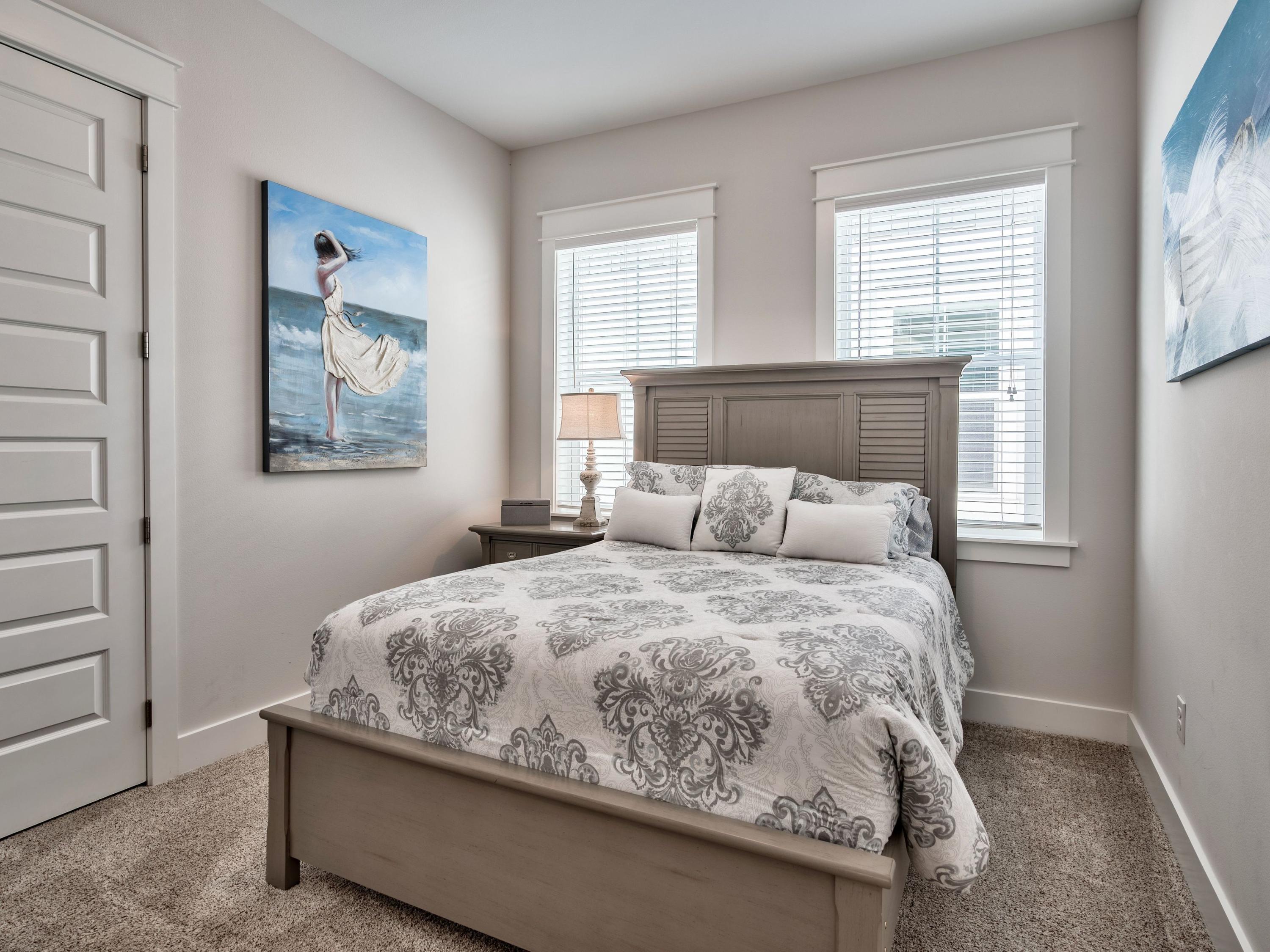 25 York Ln Inlet Beach, Unit B Inlet Beach, FL 32461 - Photo 8 of 14 a bed sitting in a bedroom next to a window