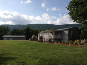 4456 Purchase Ridge Road Duffield, VA 24244 - Photo 1 of 13 Home GarageWorkshop