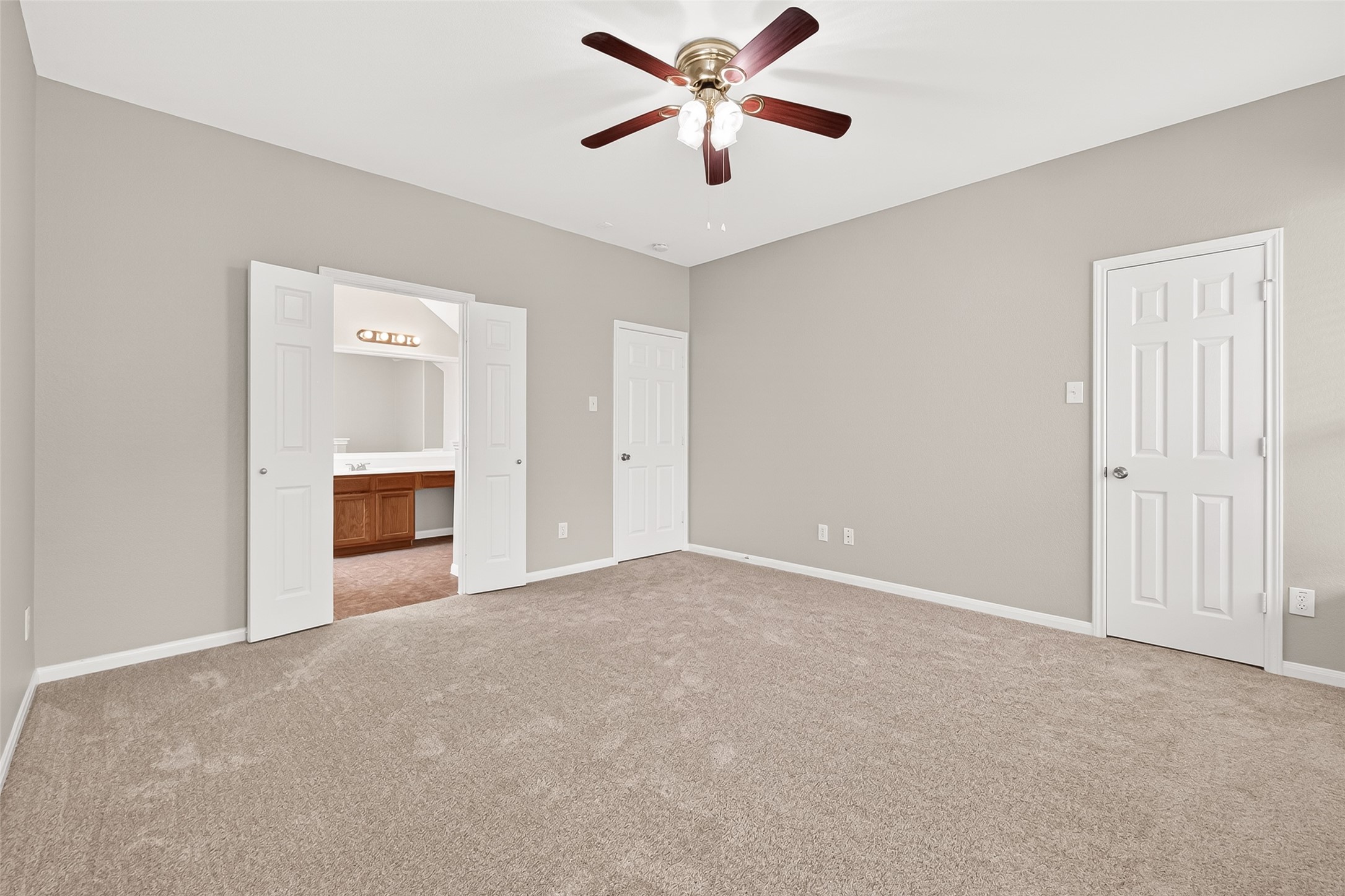 21327 Bella Flora Court Spring, TX 77379 - Photo 21 of 50 a view of a livingroom with a ceiling fan and a ceiling fan
