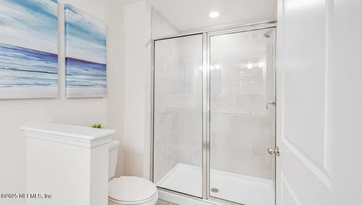 150 Hubbard Bend St. Augustine, FL 32092 - Photo 34 of 37 a bathroom with a shower a toilet and a shower