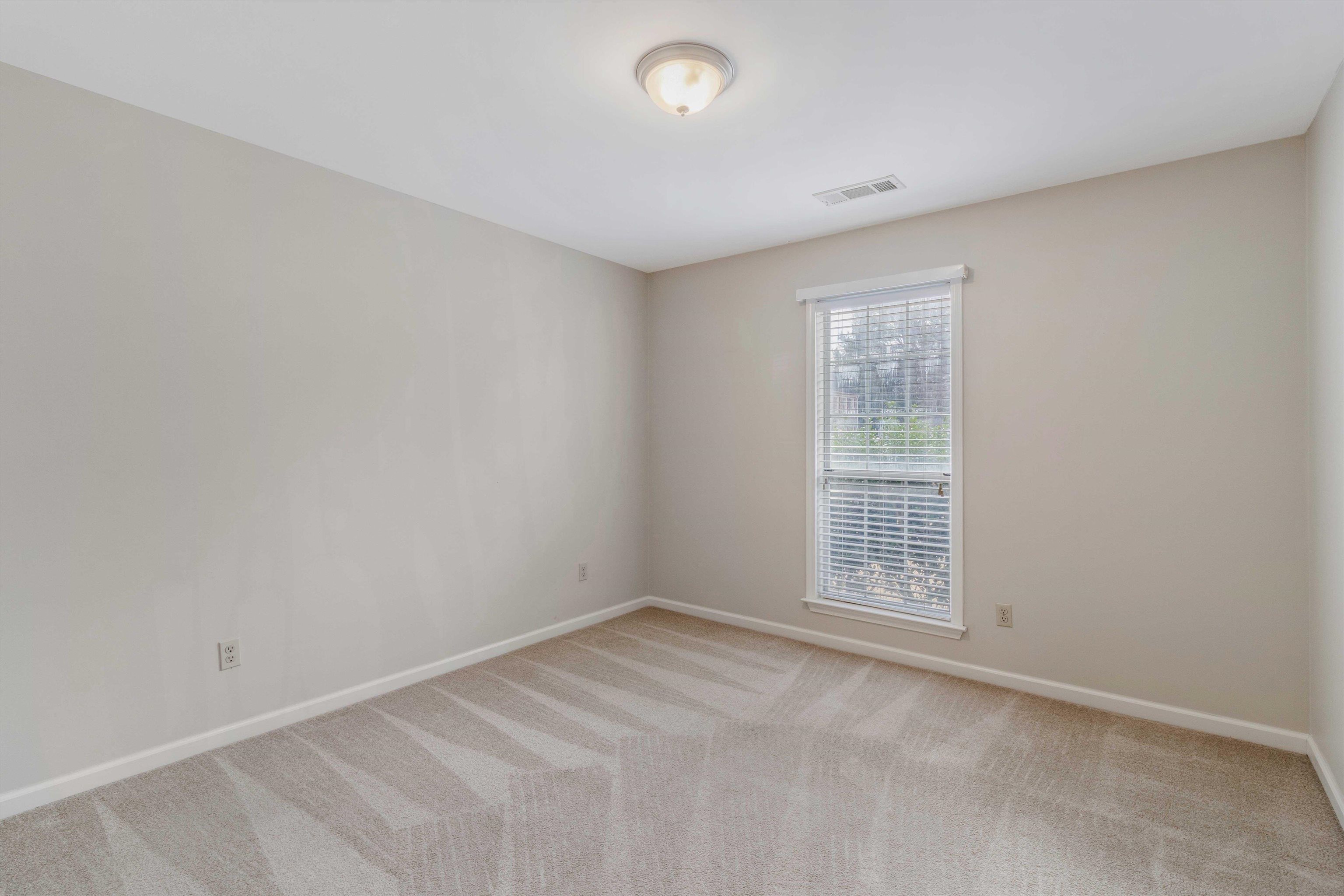 486 Harts Way Drive Collierville, TN 38017 - Photo 21 of 39 an empty room with windows