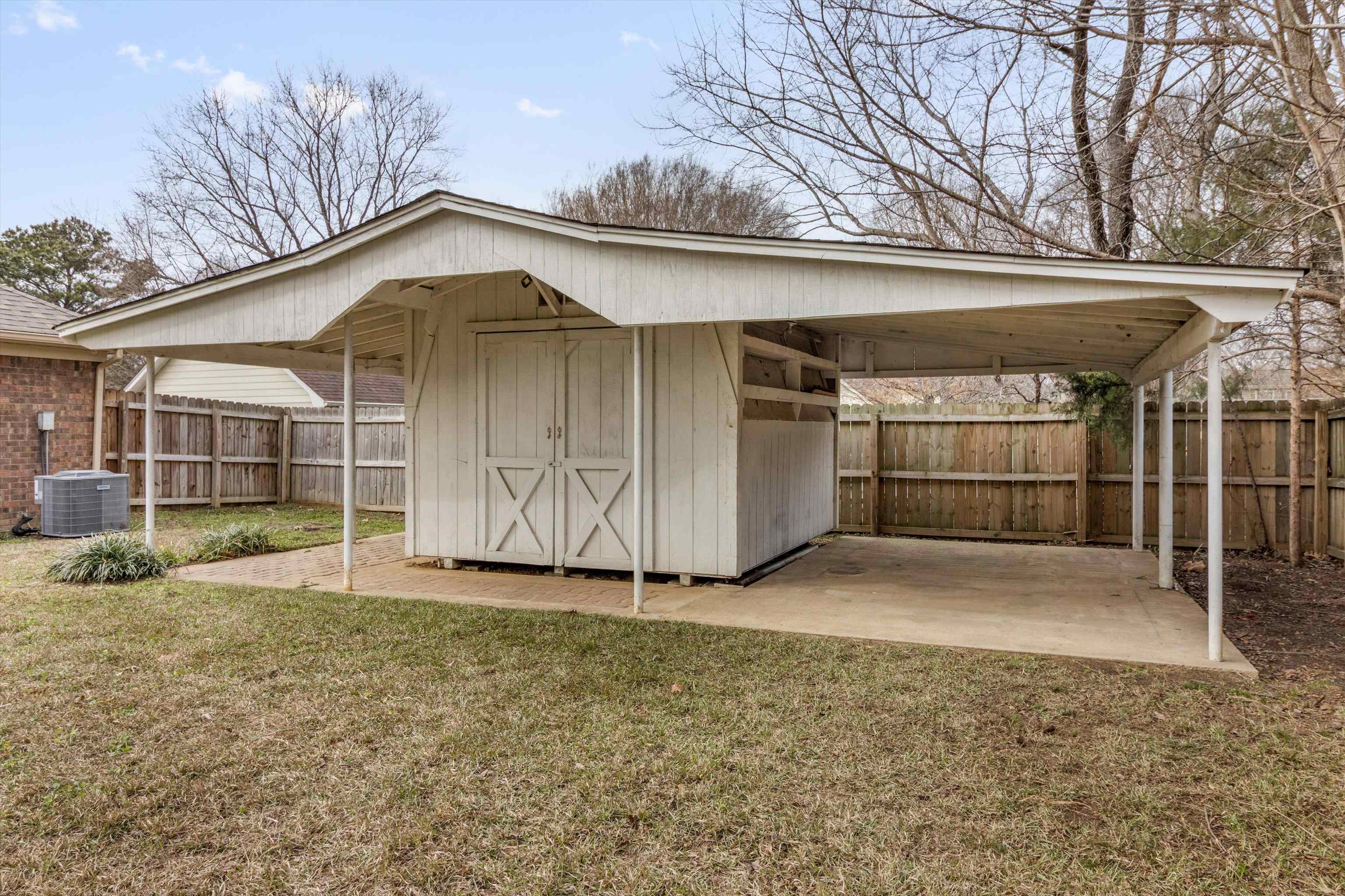 486 Harts Way Drive Collierville, TN 38017 - Photo 24 of 39 a view of backyard with a tub