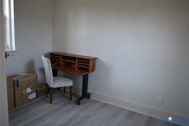 a kitchen with stainless steel appliances granite countertop a stove a refrigerator and a microwave