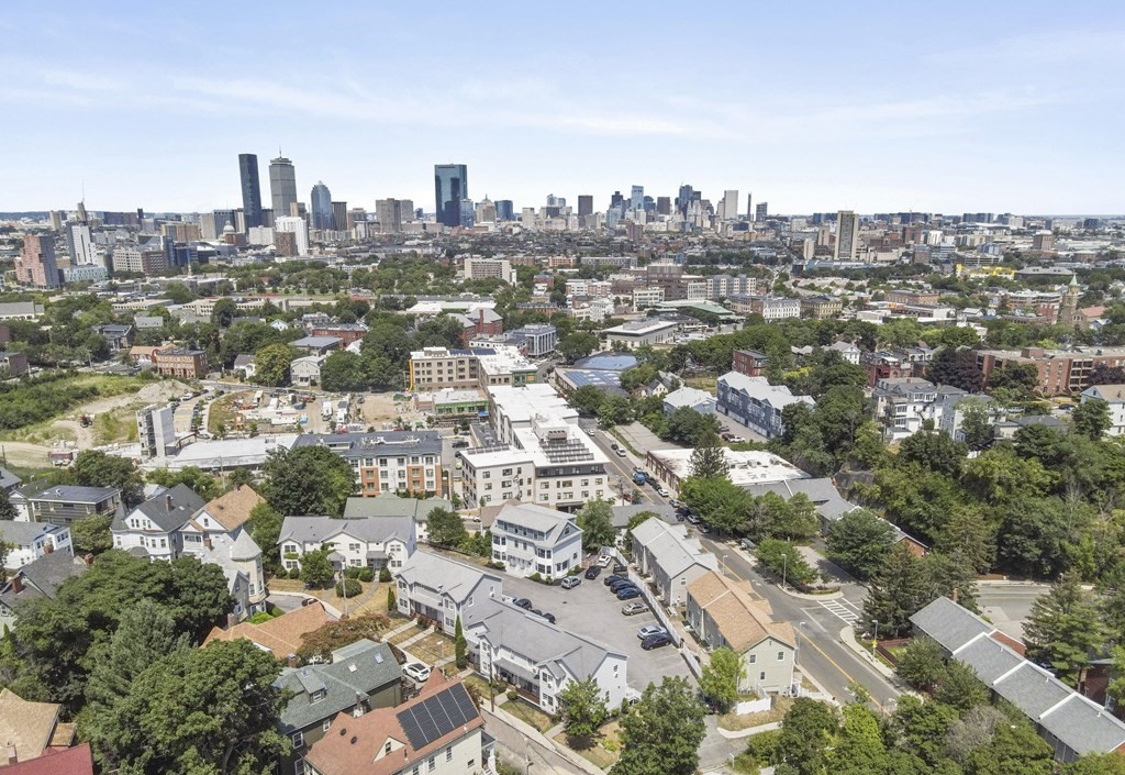 31-35 Juniper Street Boston, MA 02119 - Photo 14 of 14 an aerial view of a city with lots of residential buildings
