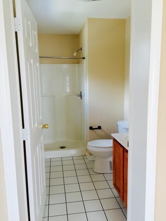 31-35 Juniper Street Boston, MA 02119 - Photo 4 of 14 a bathroom with a toilet a sink and shower