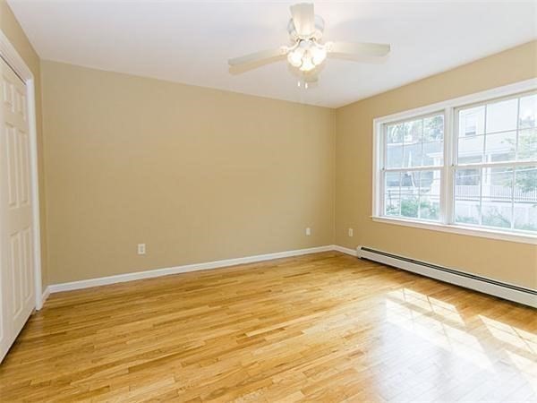 31-35 Juniper Street Boston, MA 02119 - Photo 7 of 14 a view of an empty room with a window