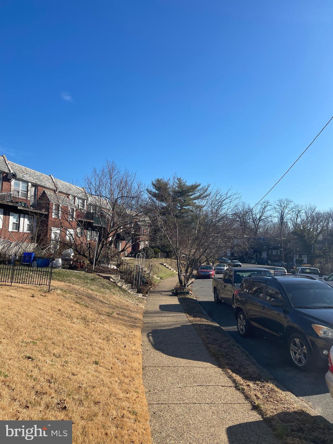 3937 Ellington Road, Unit 2 Philadelphia, PA 19131 - Photo 17 of 17 a view of city street with with trees