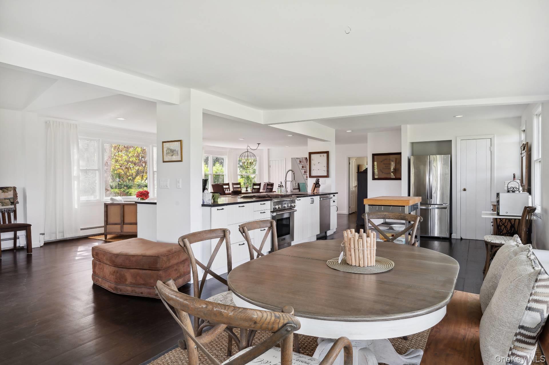 2600 Oregon Road Mattituck, NY 11952 - Photo 18 of 30 a dining room with furniture and wooden floor