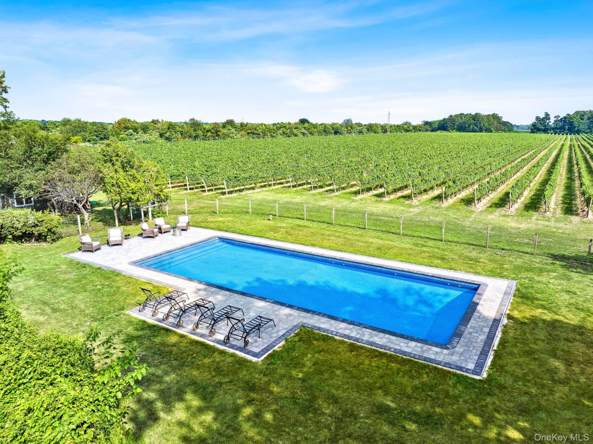 2600 Oregon Road Mattituck, NY 11952 - Photo 3 of 30 a view of a yard with an ocean view