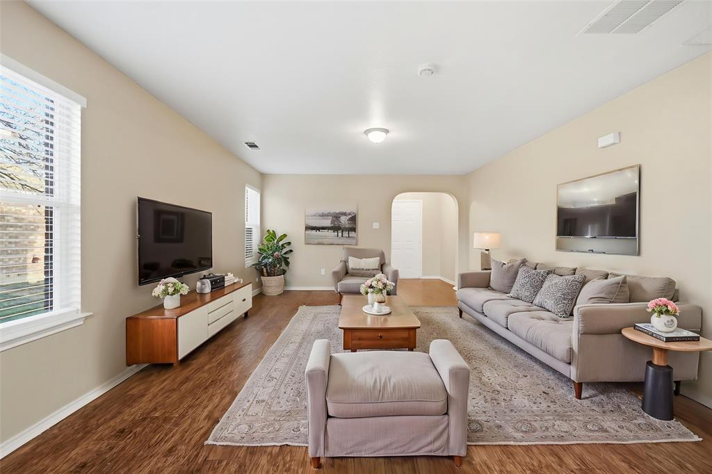 111 Maned Drive Sanger, TX 76266 - Photo 5 of 40 a living room with furniture flat screen tv and window