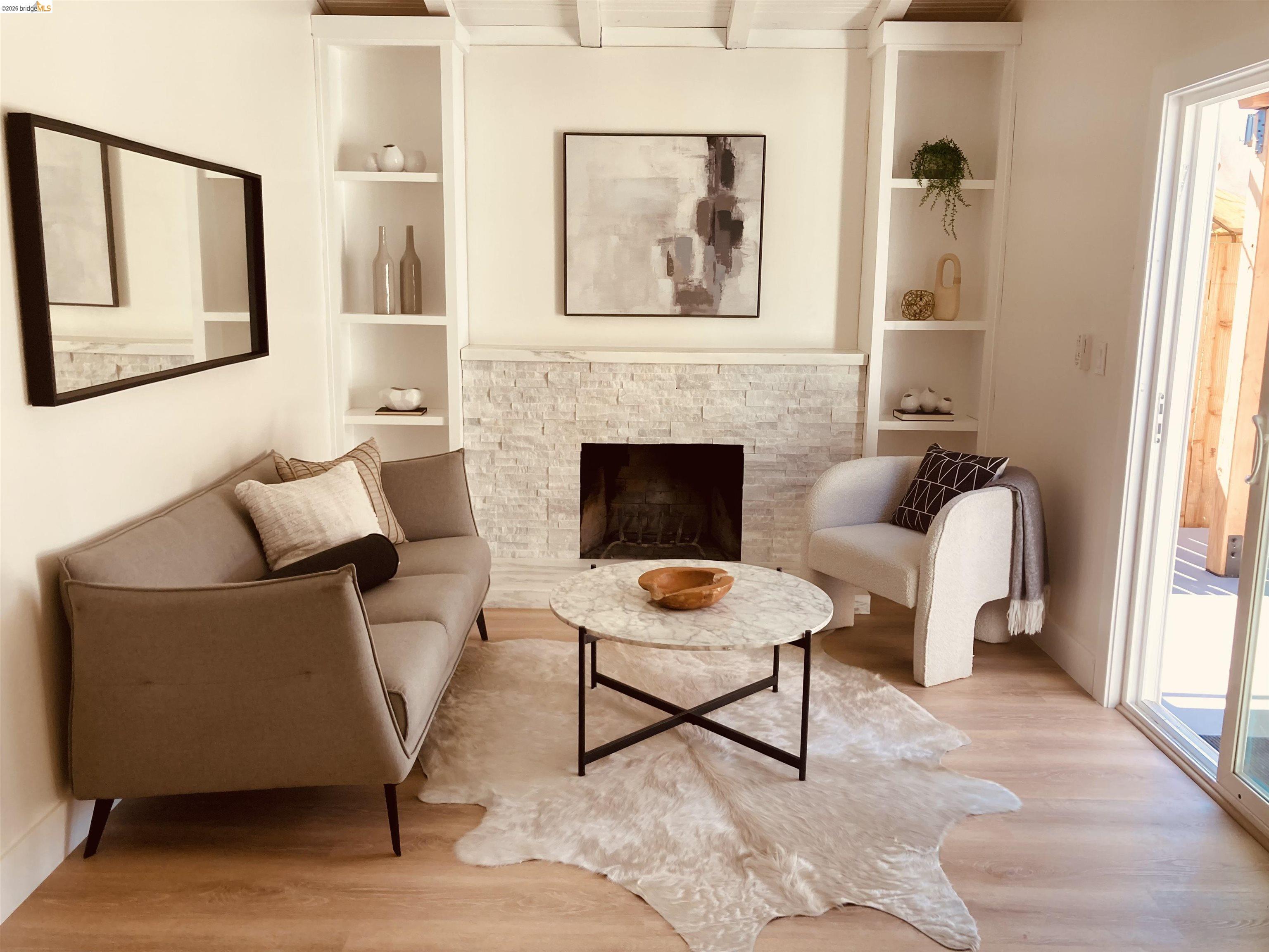375 Senter Road San Jose, CA 95111 - Photo 24 of 80 a living room with furniture and a fireplace
