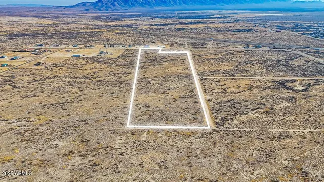 a view of ocean and mountain