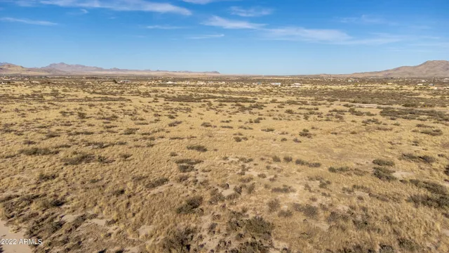a view of mountain with lake view
