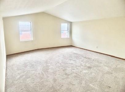 40 Race Street, Unit 2D Manor, PA 15665 - Photo 4 of 9 an empty room with windows