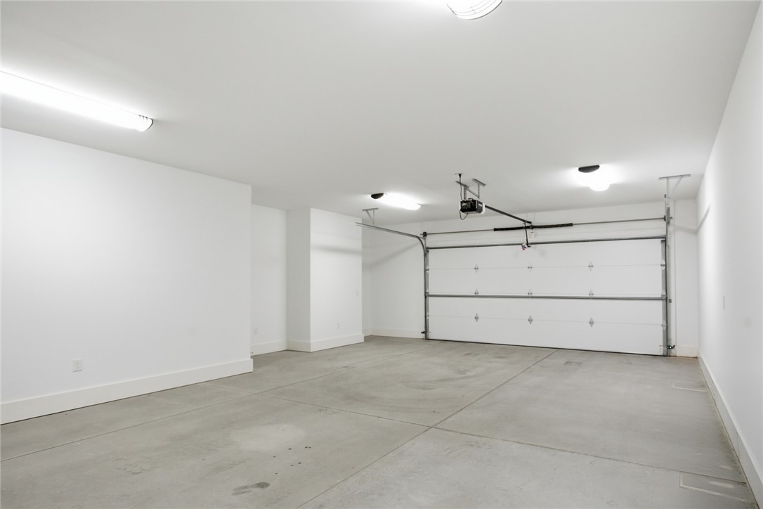 147 McAlister Road West Union, SC 29696 - Photo 36 of 49 This spacious garage offers ample room and direct access for vehicles and storage.