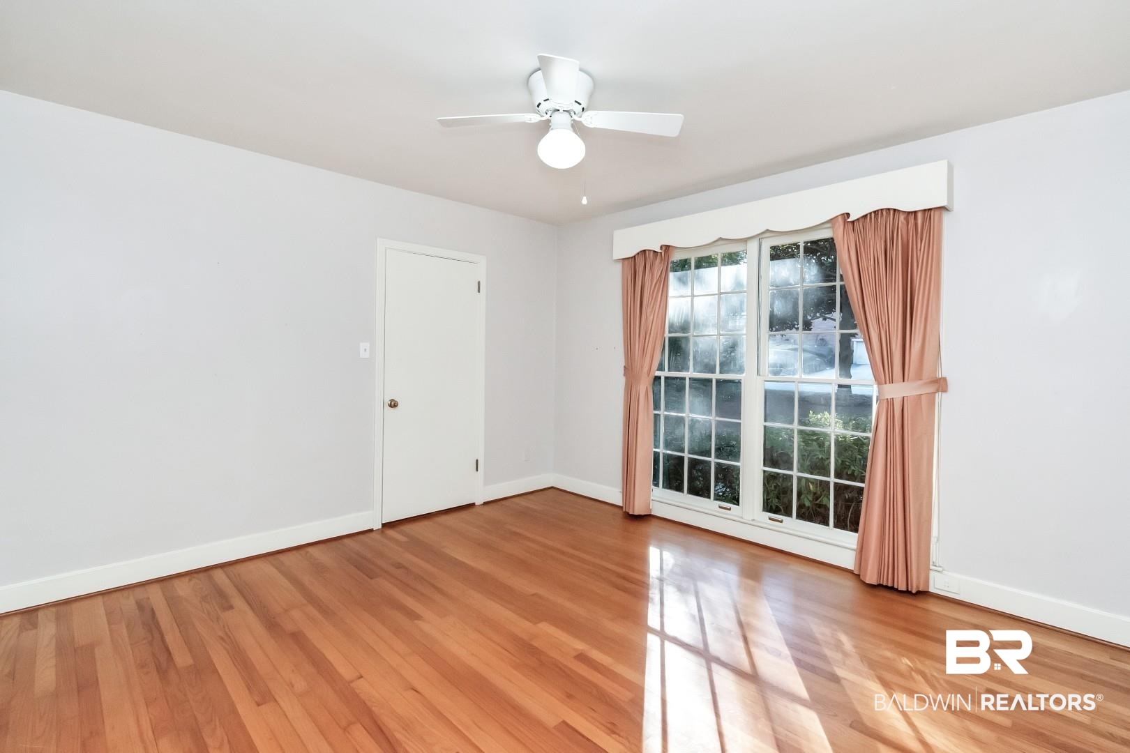 308 Brawood Drive Mobile, AL 36608 - Photo 18 of 33 Empty room with ceiling fan and hardwood / wood-style flooring