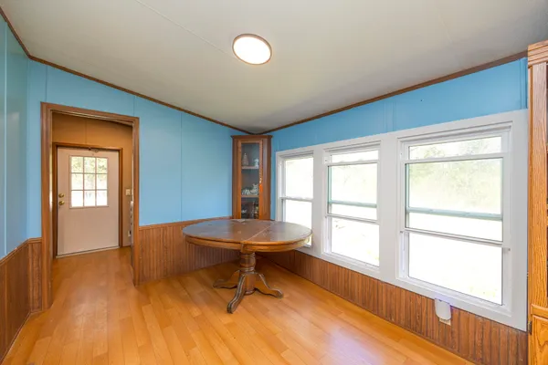 a living room with a table and a window