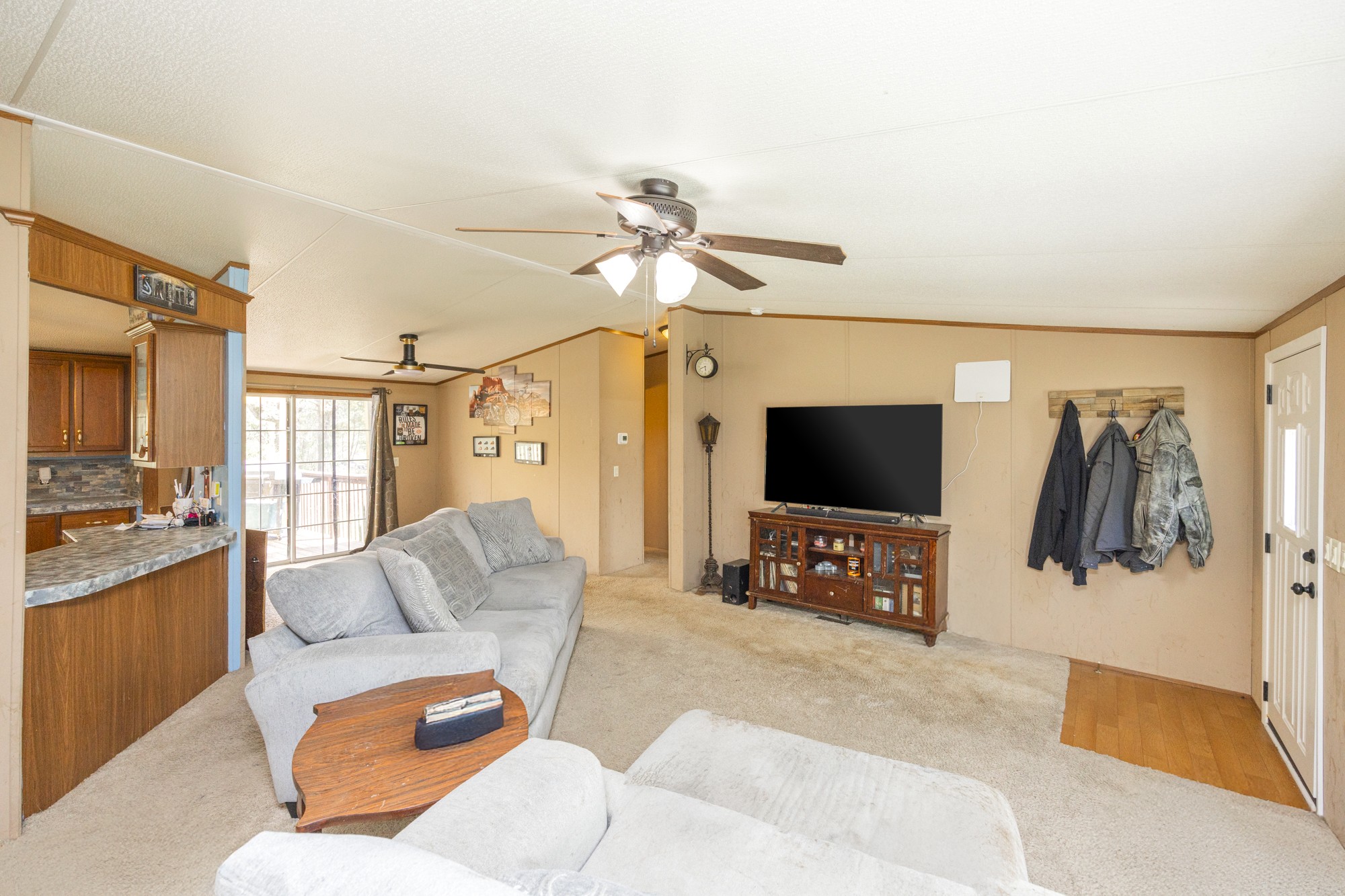 8591 Lowe Christiana Road Christiana, TN 37037 - Photo 14 of 37 a living room with furniture and a flat screen tv