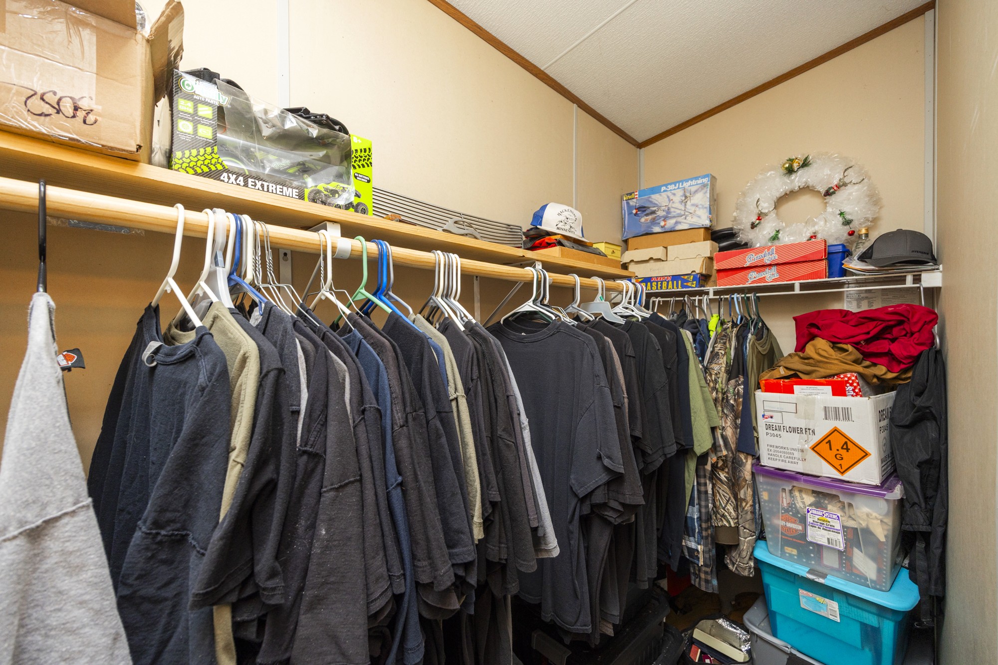 8591 Lowe Christiana Road Christiana, TN 37037 - Photo 20 of 37 a view of walk in closet with clothes and shoes