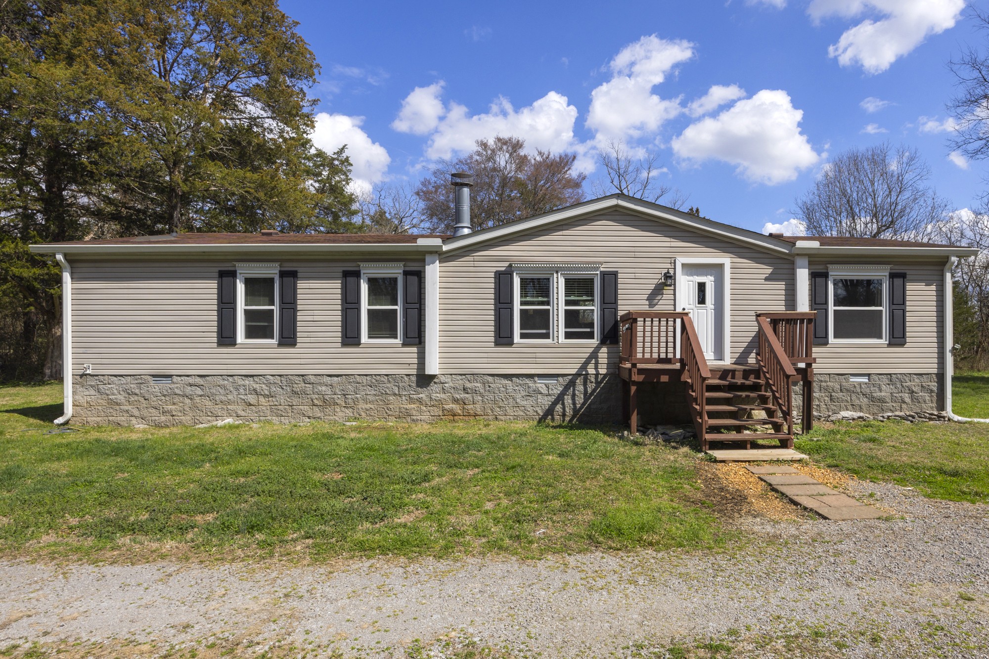 8591 Lowe Christiana Road Christiana, TN 37037 - Photo 2 of 37 front view of a house with a yard