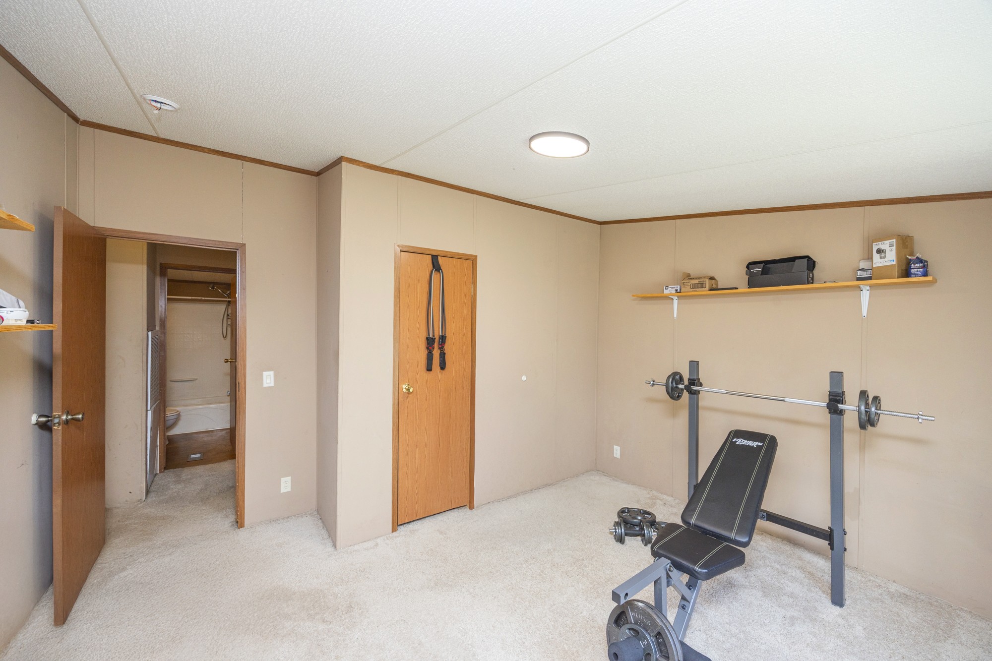 8591 Lowe Christiana Road Christiana, TN 37037 - Photo 24 of 37 a view of a livingroom with a chair and painted walls