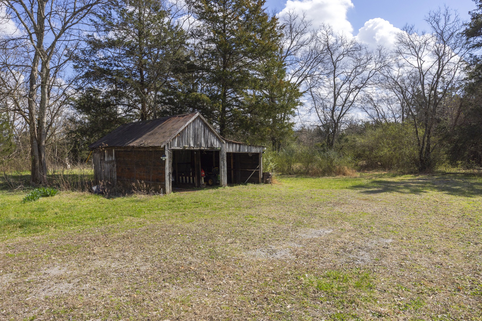 8591 Lowe Christiana Road Christiana, TN 37037 - Photo 31 of 37 a front view of a house with a yard