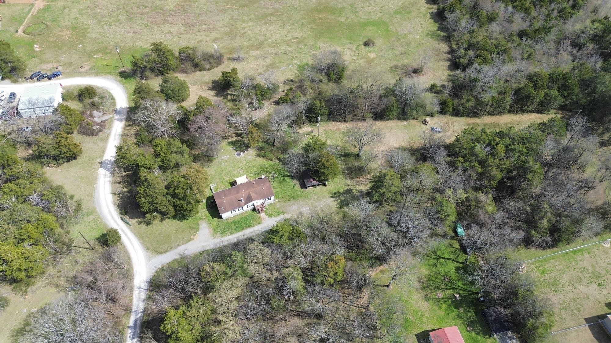 8591 Lowe Christiana Road Christiana, TN 37037 - Photo 37 of 37 an aerial view of a house with a yard