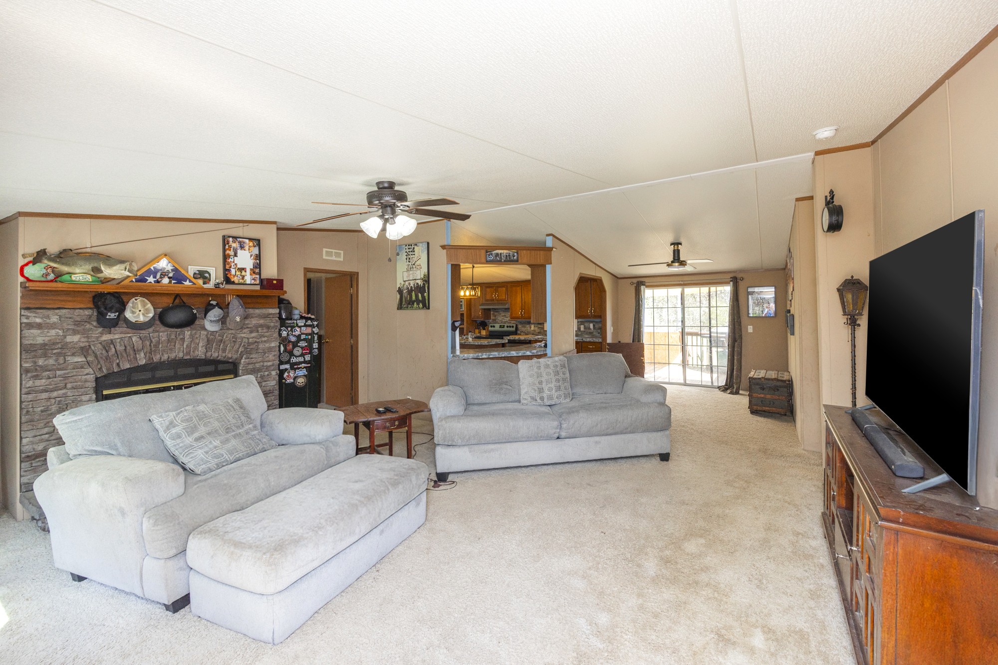 8591 Lowe Christiana Road Christiana, TN 37037 - Photo 5 of 37 a living room with furniture and a flat screen tv